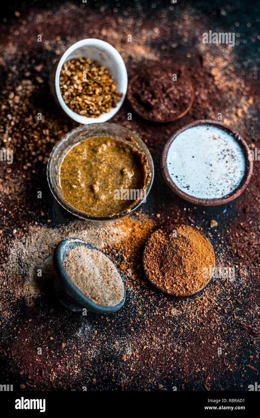 Close up of face pack of mung bean or green gram on wooden surface with sandalwood powder,milk,green gram powder,milk.This face pack is used in sap to Stock Photo