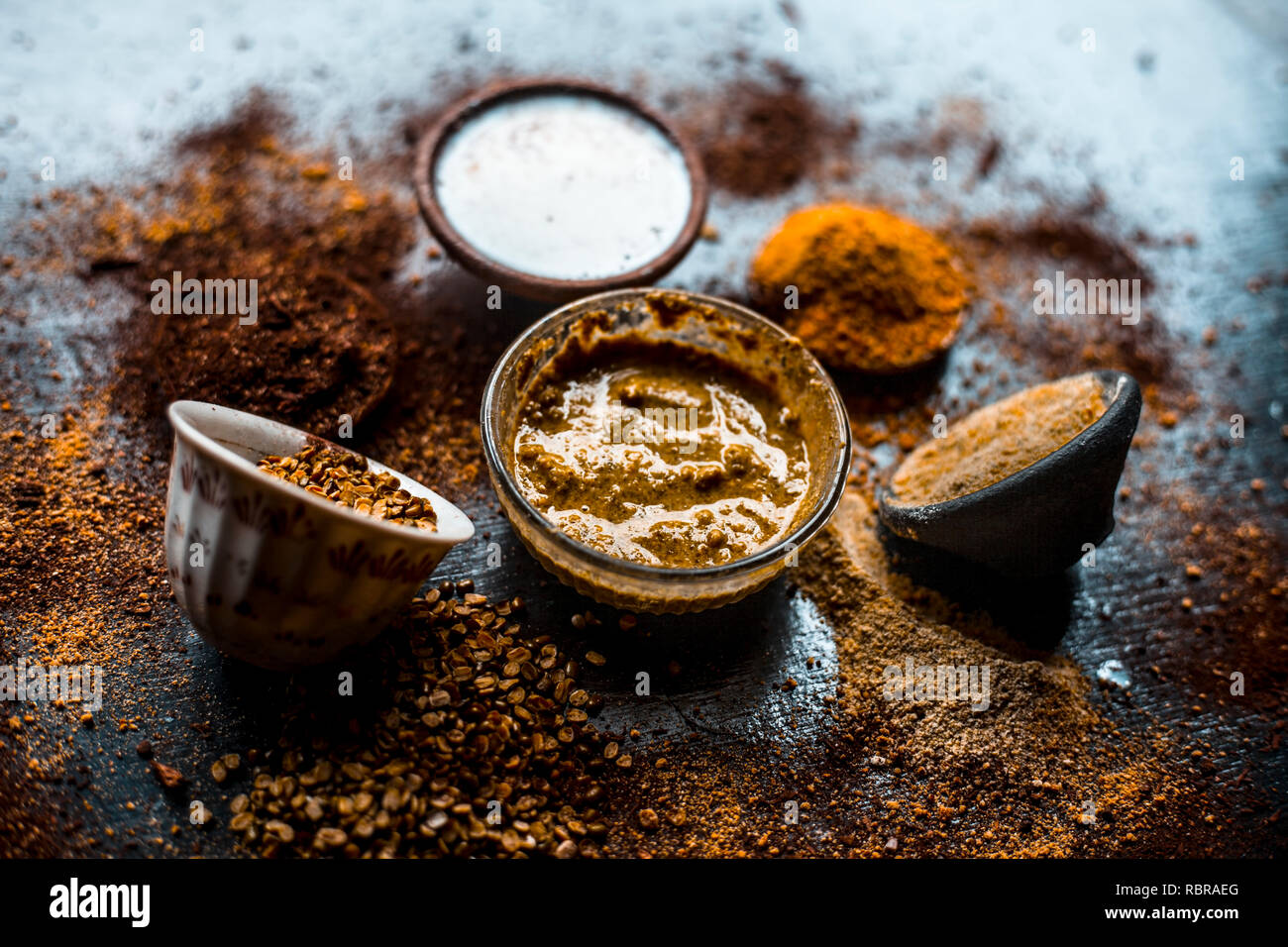 Close up of mung dal face pack with aloe vera,sandalwood,milk, and with green grams on wooden surface. Stock Photo