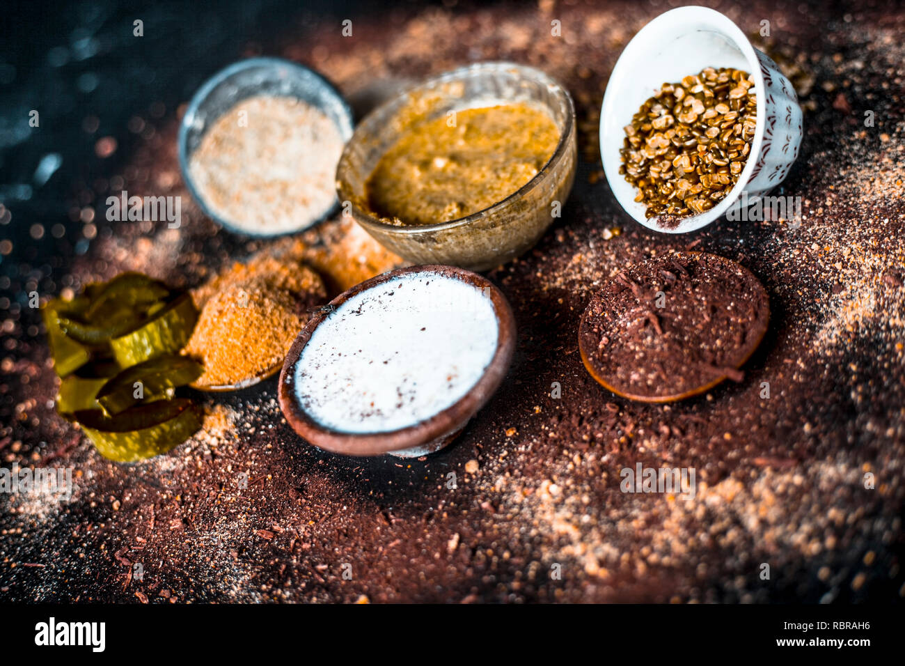 Close up of mung dal face pack with aloe vera,sandalwood,milk, and with green grams on wooden surface. Stock Photo