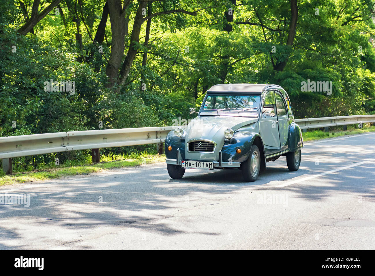 MALACKY, SLOVAKIA – JUNE 2 2018:  Citroen 2CV takes part in the run during the veteran car rally Kamenak 2018 at the Kamenny mlyn roadhouse Stock Photo