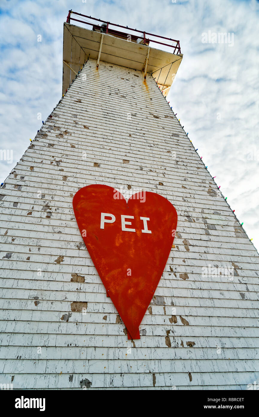 Prince Edward Island lighthouse with a heart sign adorning it. Stock Photo