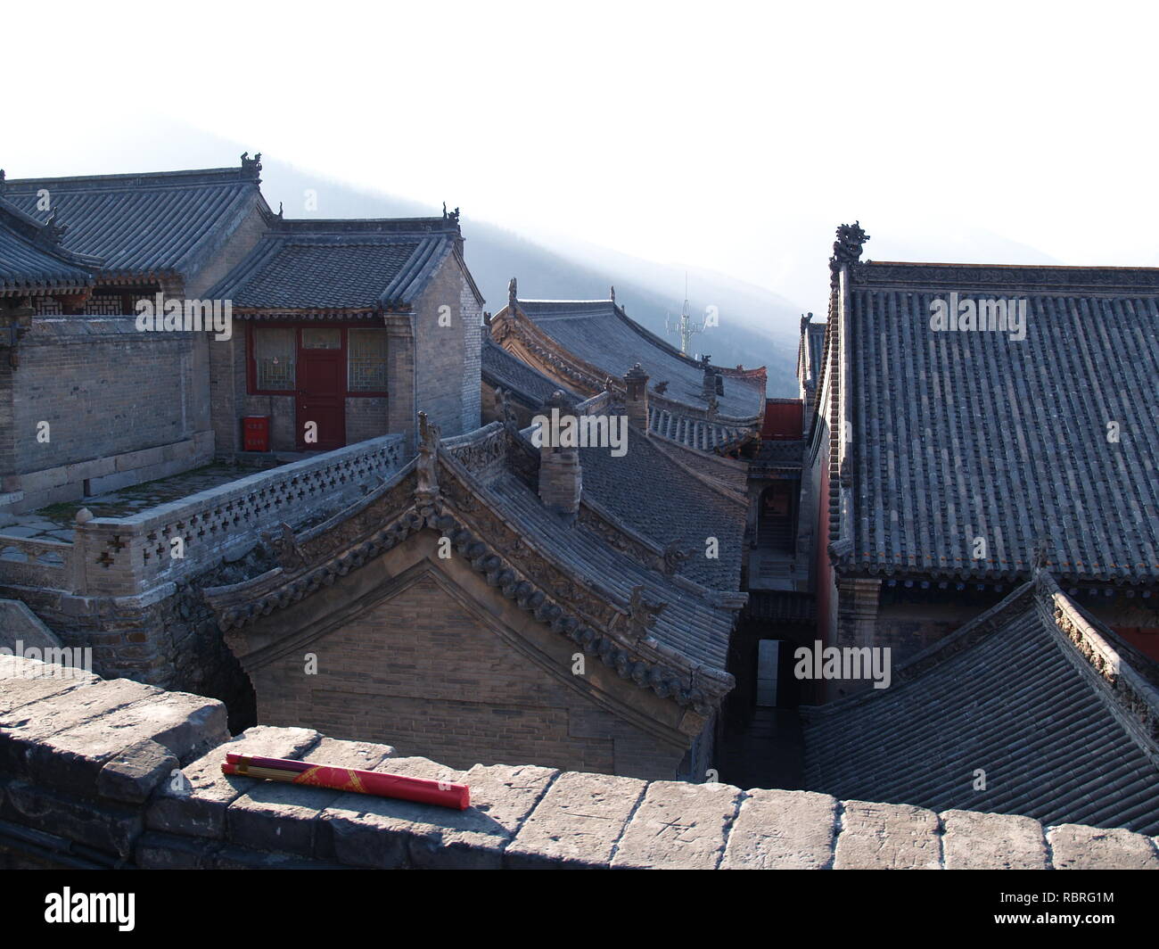 Chinese monastery in mountains at dusk Stock Photo