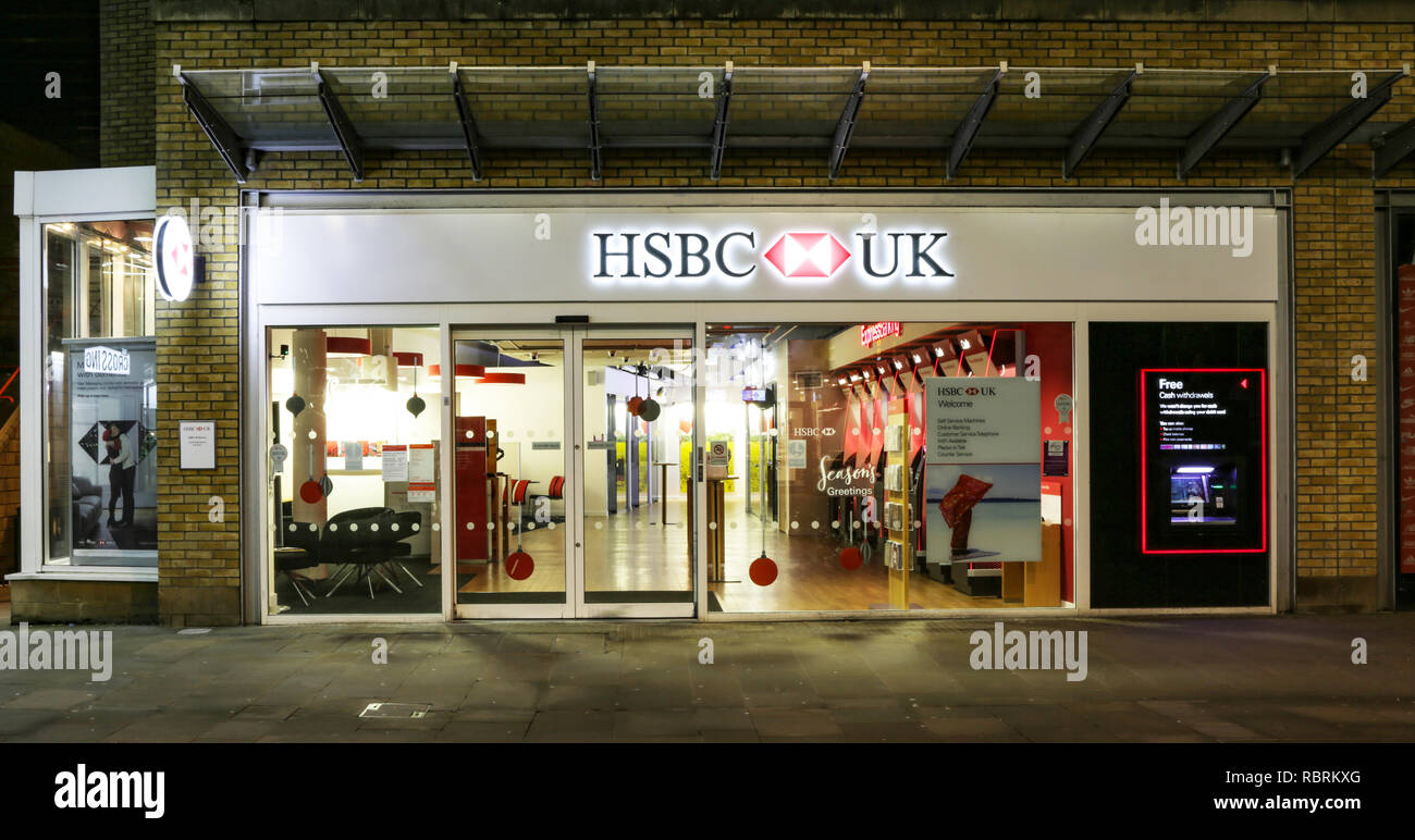 SWINDON, UK - JANUARY 1, 2019: HSBC bank  front in Swindon Town centre by night Stock Photo