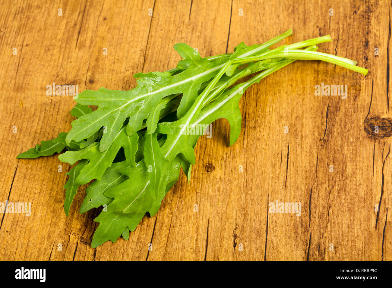 Green fresh Rucola leaves Stock Photo - Alamy