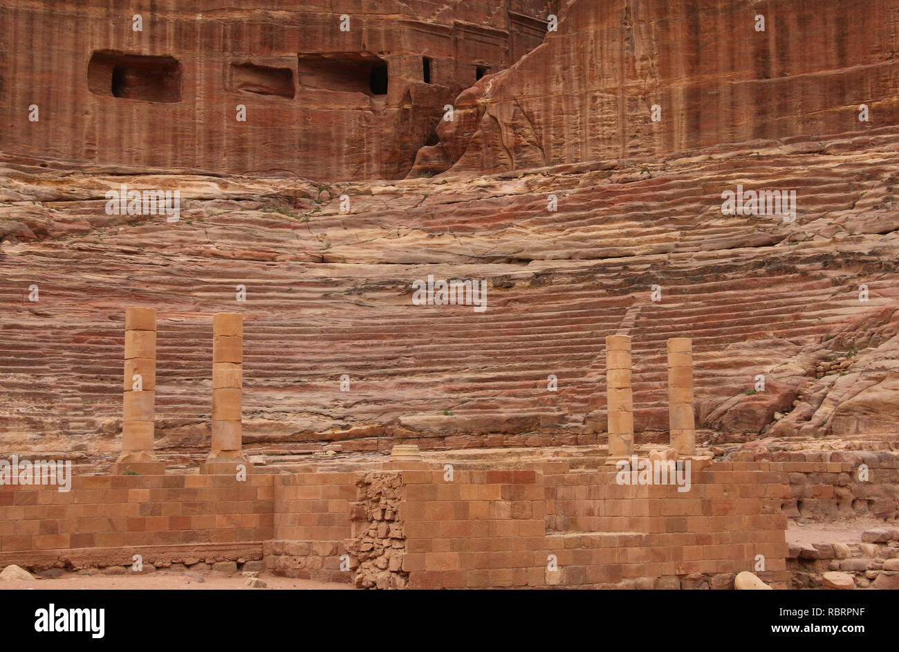 Roman theater in the ancient Arab Nabataean Kingdom city of Petra. Jordan Stock Photo