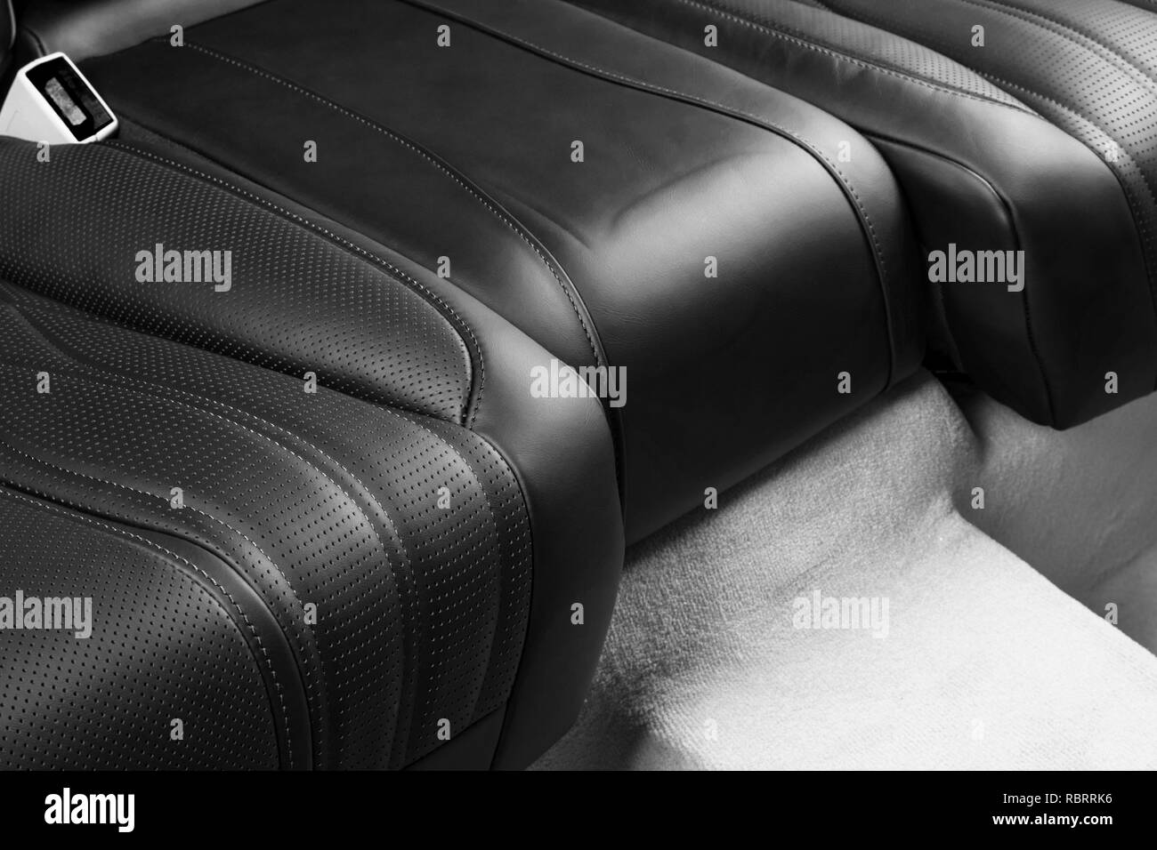 Modern Luxury car inside. Interior of prestige modern car. Comfortable leather seats. Black