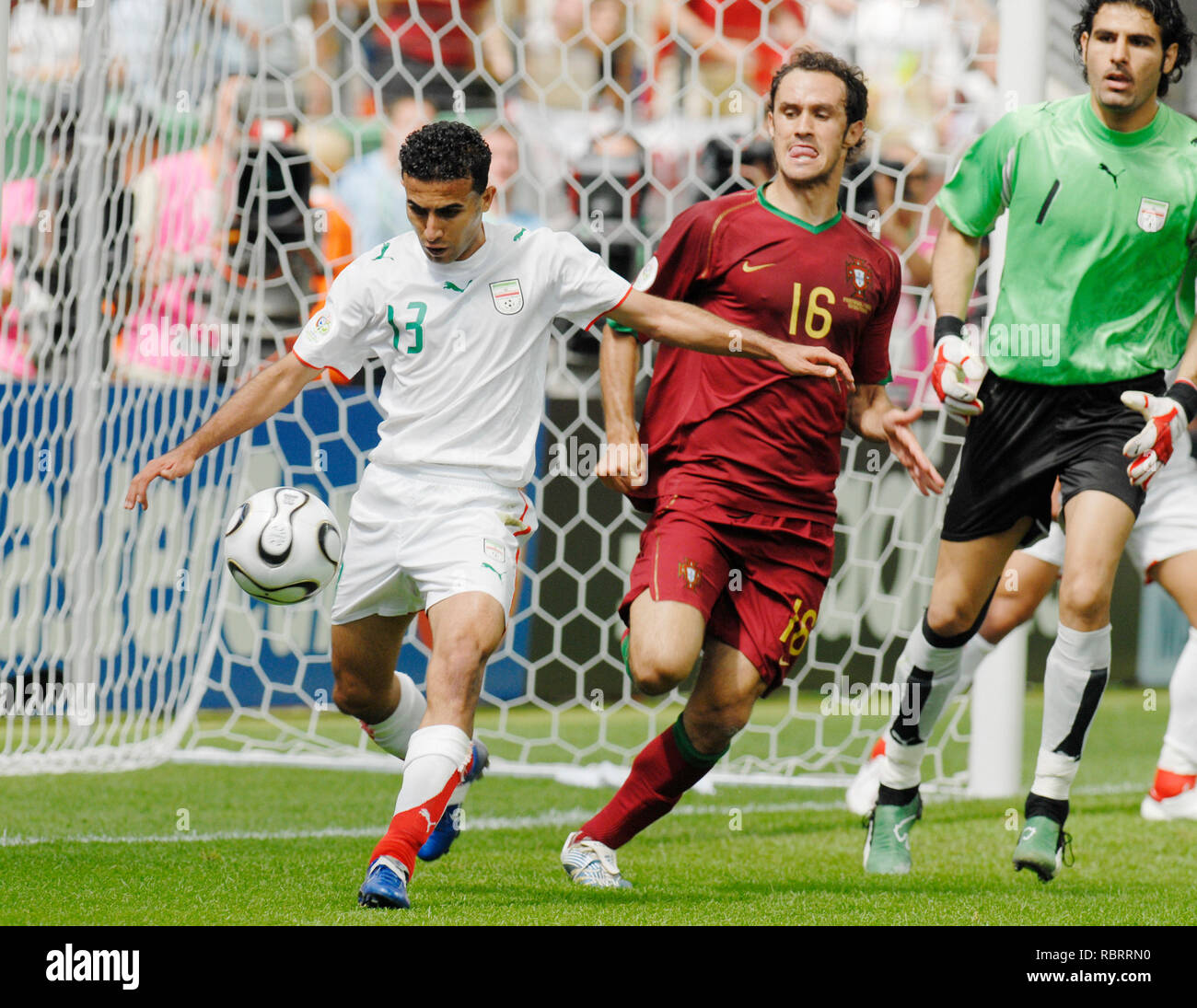 FIFA WM Stadion Frankfurt  Germany, 17.06.2006,  FIFA  World Cup Germany 2006  Portugal  vs Iran 2:0 --- Hossein KAABI (IRA), RICARDO CARVALHO (POR) Stock Photo