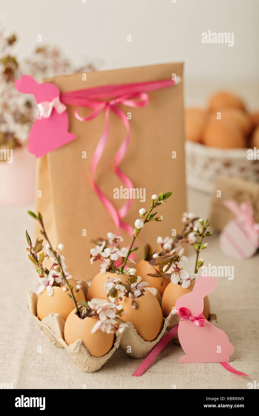 Happy easter. Easter decoration - flowering branches in the shell from the eggs. Selective focus. Stock Photo