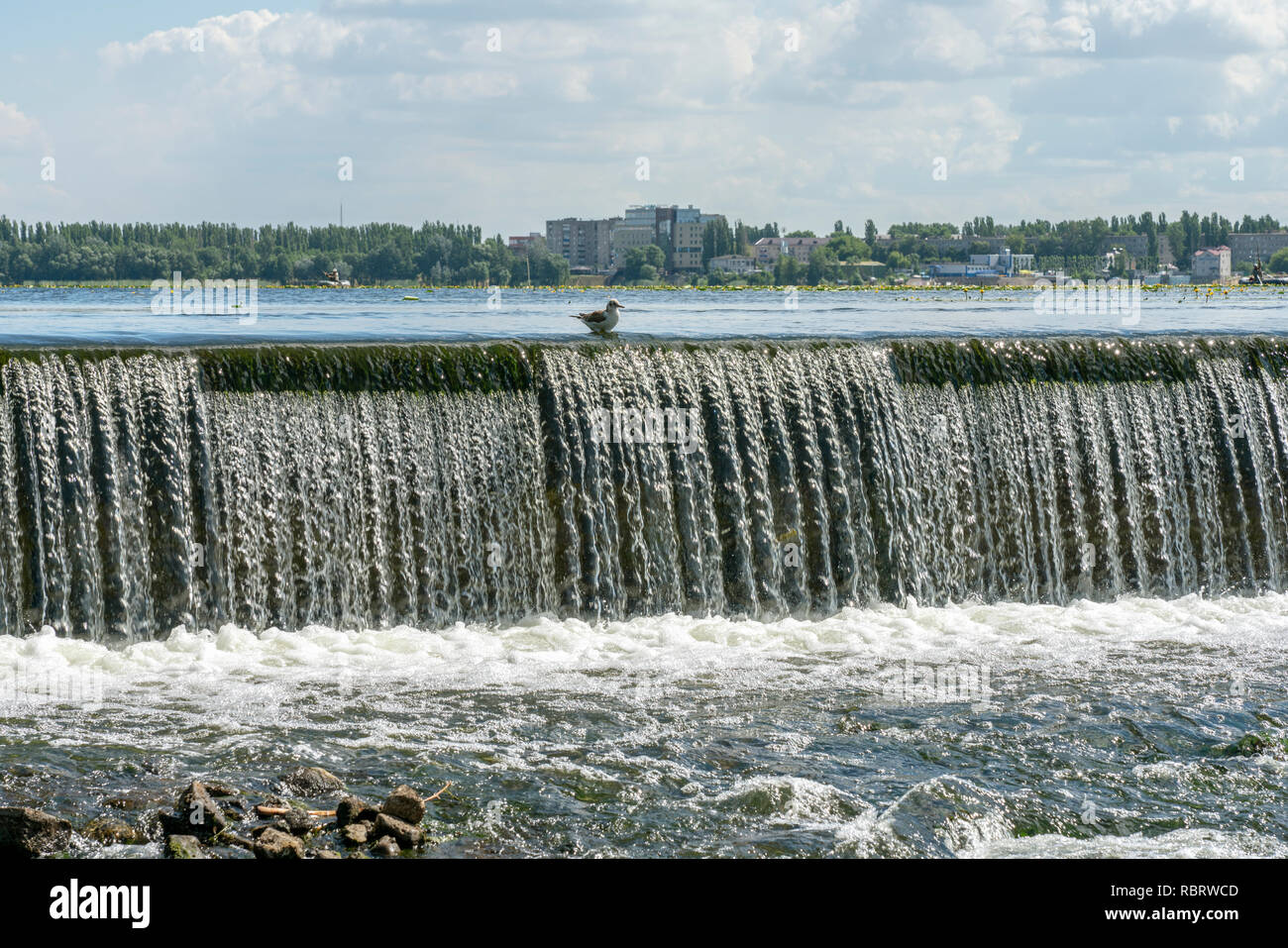 Regulated water flow of that flows through the middle of a city. Russia, Lipetsk. Stock Photo