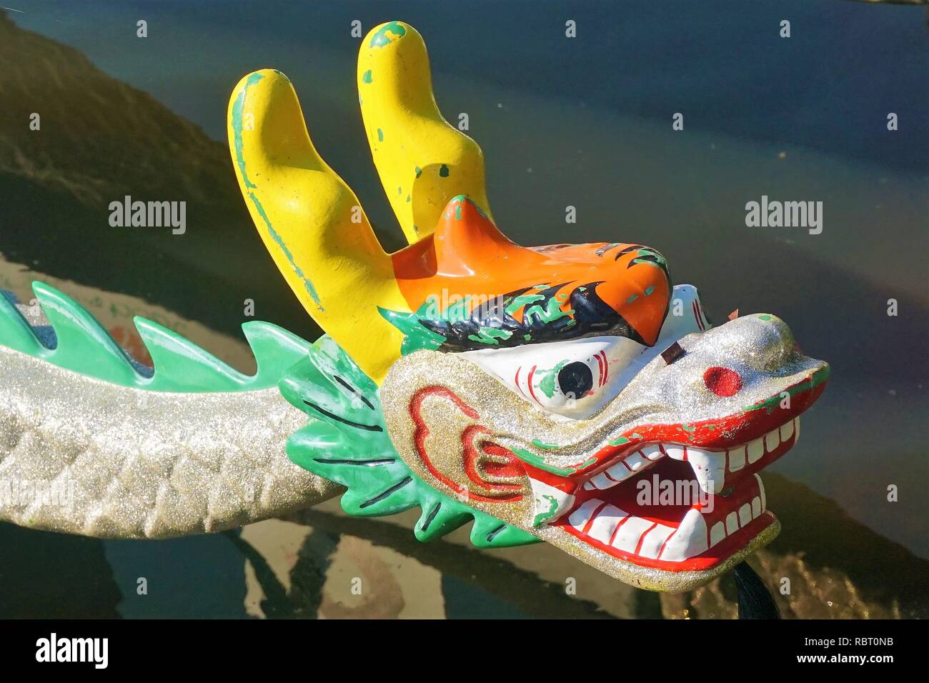 Dragon on the bow of a Chinese dragon boat Stock Photo