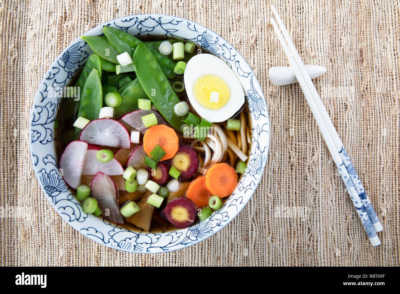 Filling bowl with udon noodle soup series final image bowl with