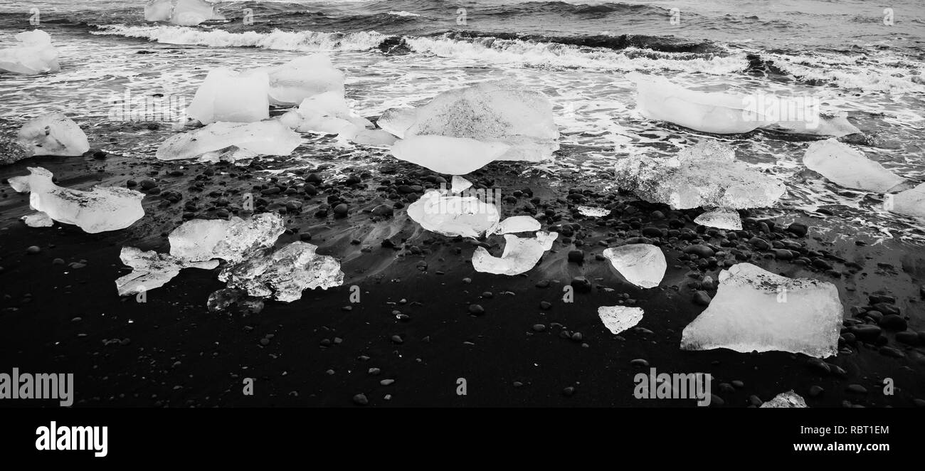 Giant ice blocks detached from icebergs on the coast of an Icelandic