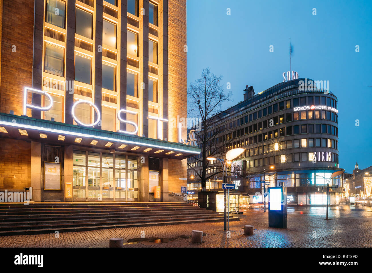 Helsinki, Finland - December 8, 2016: Post Office Building And Original Sokos Hotel In Evening Night Illumination. Stock Photo