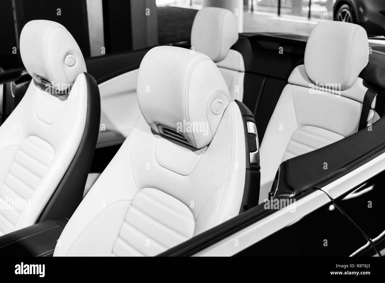 Modern Luxury car inside. Interior of prestige modern car. Comfortable leather seats. White