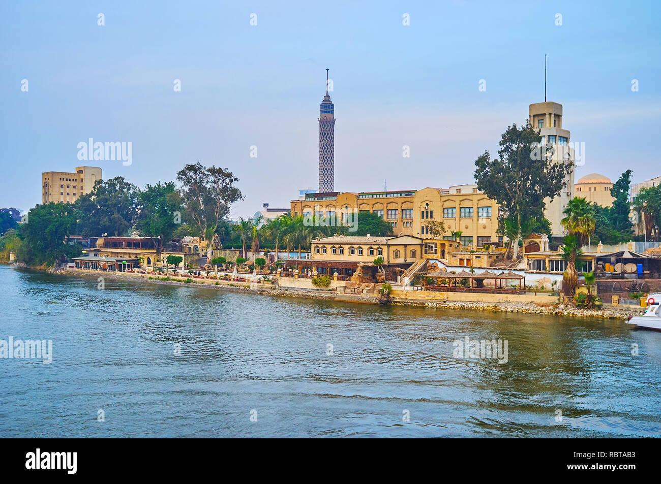 The green bank of Gezira Island with historic buildings of Cairo's National Cultural Centre, including Opera House and other performing arts theatres, Stock Photo