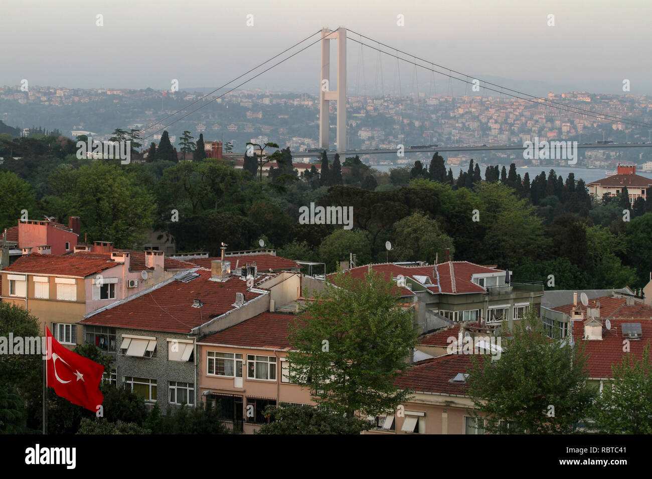 The Bosphorus Bridge visible across rooftops, Istanbul, Turkey Stock Photo