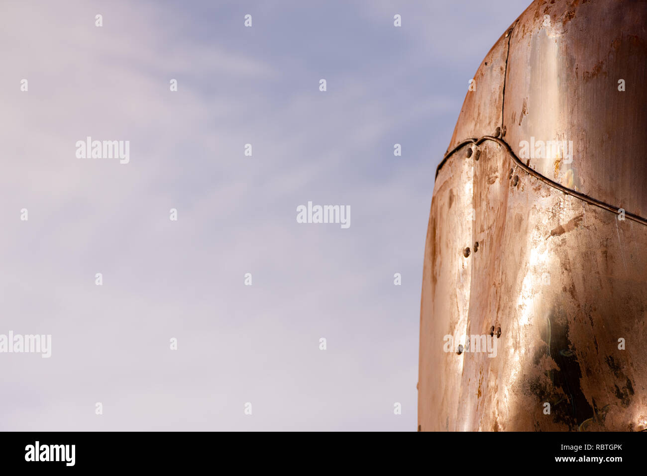 Rusted steel plates joined with rivets Stock Photo