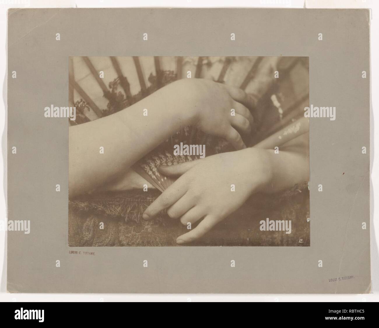 -Hands with Fan Stock Photo - Alamy