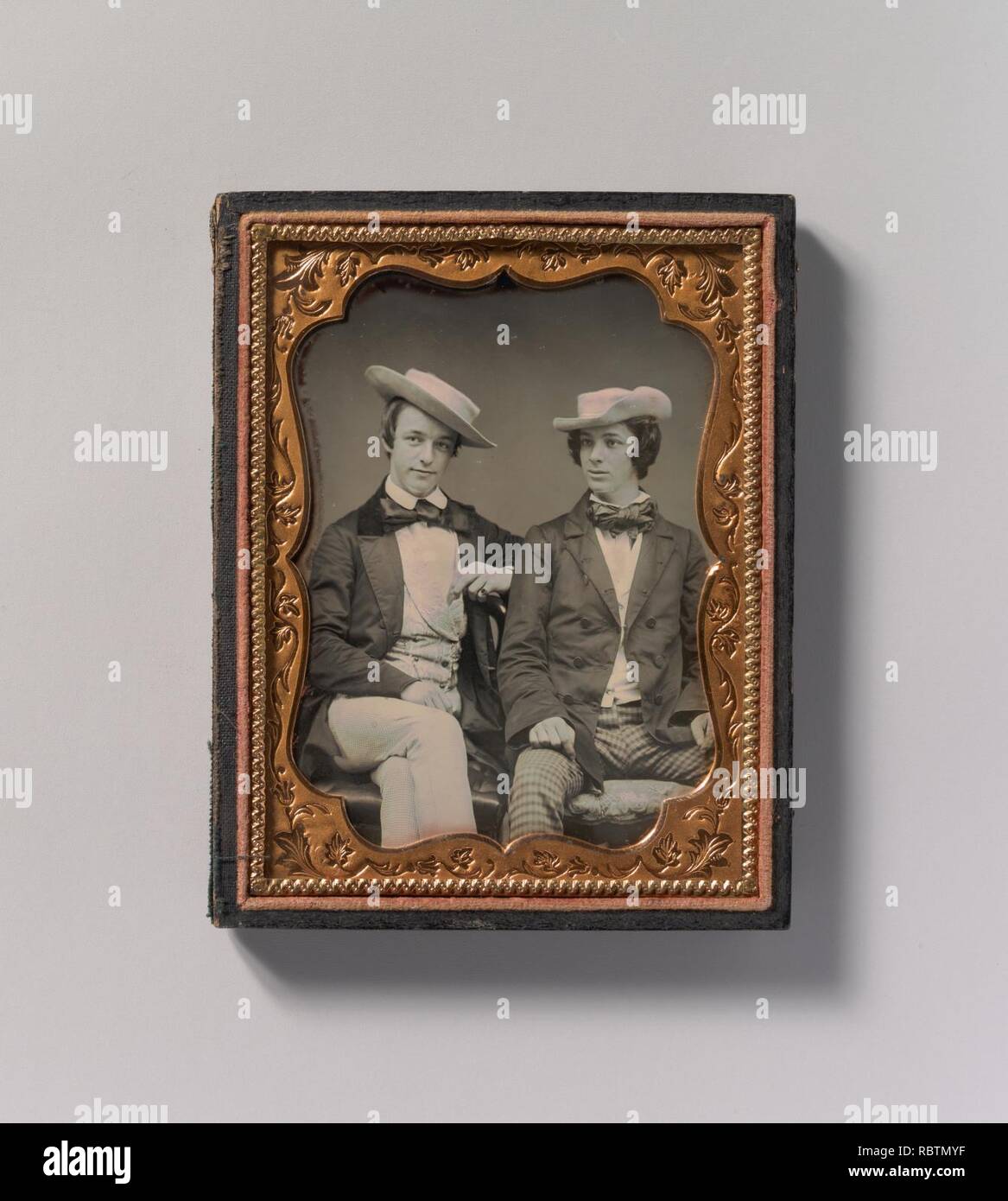 Two seated men wearing hats hi-res stock photography and images - Alamy