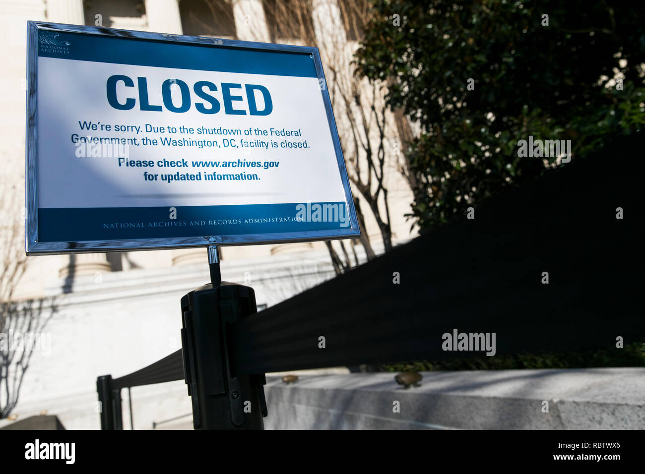 Washington, DC, USA. 11th Jan, 2019. A sign outside of the National Archives Building informing visitors that the building is closed due to the partial Government shutdown in Washington, DC on January 11, 2019. The shutdown, now entering it's 22nd day, is the longest Government shutdown in U.S. history. Credit: Kristoffer Tripplaar/Alamy Live News Stock Photo