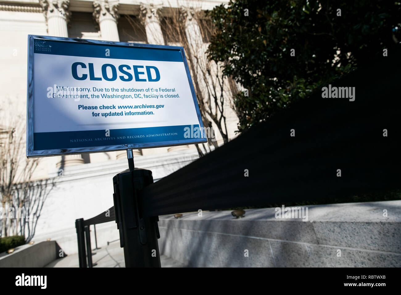 Washington, DC, USA. 11th Jan, 2019. A sign outside of the National Archives Building informing visitors that the building is closed due to the partial Government shutdown in Washington, DC on January 11, 2019. The shutdown, now entering it's 22nd day, is the longest Government shutdown in U.S. history. Credit: Kristoffer Tripplaar/Alamy Live News Stock Photo