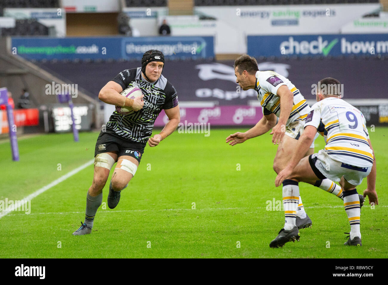 Ospreys lock James King on the attack in the European Rugby Challenge Cup rugby match between Ospreys and Worcester Warriors. Stock Photo
