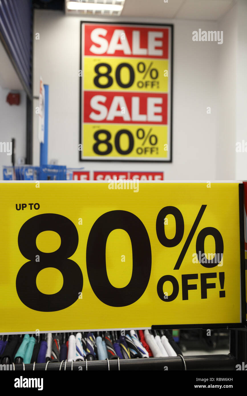 up to 80% sale off sign in a clothing store in the UK Stock Photo