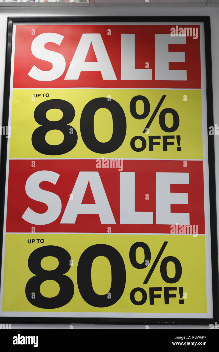 up to 80% sale off sign in a clothing store in the UK Stock Photo