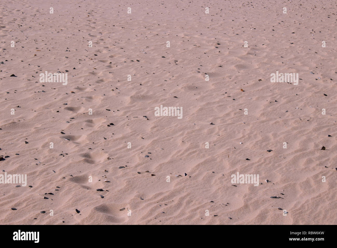 Footprints. Footprints of a man in the sand of the beach Stock Photo ...