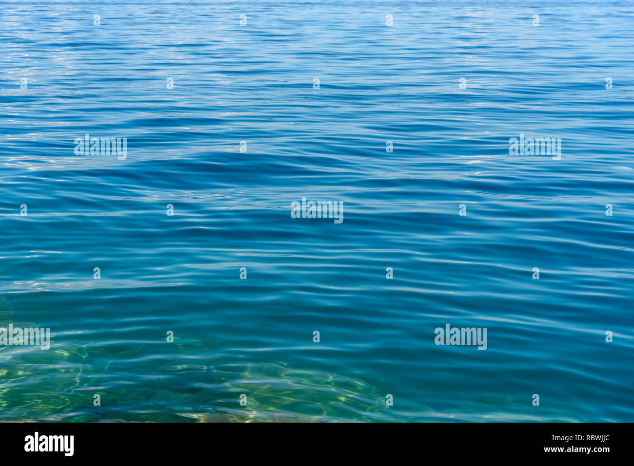 Sea blue water background texture Stock Photo - Alamy