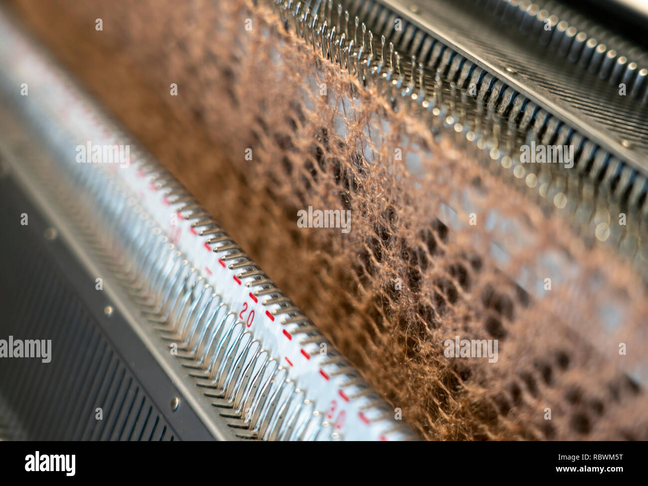 knitted product on in the process of knitting on the knitting machine