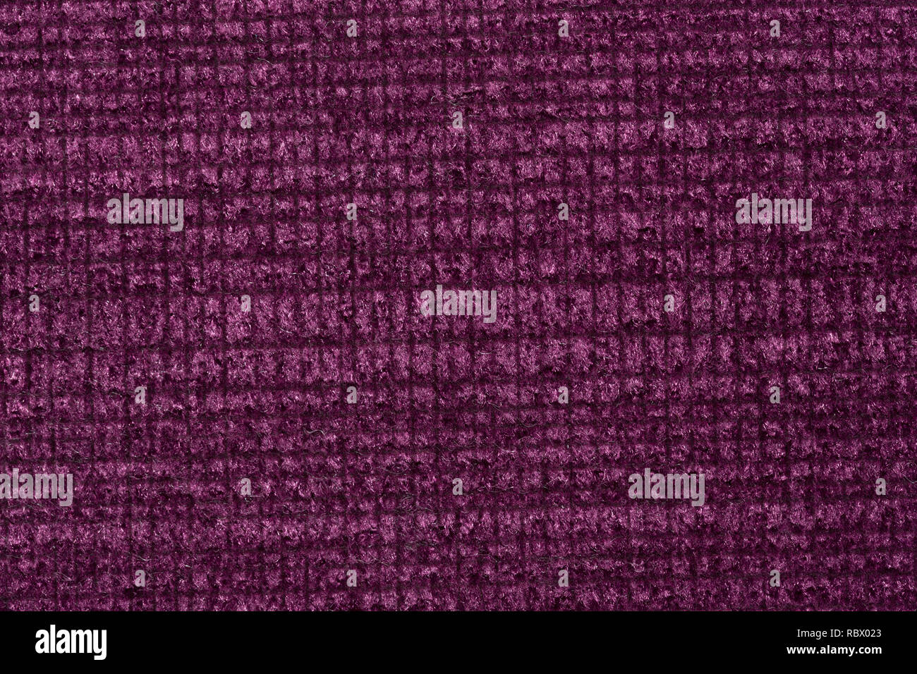 Contrast textile background in admirable violet hue. Stock Photo