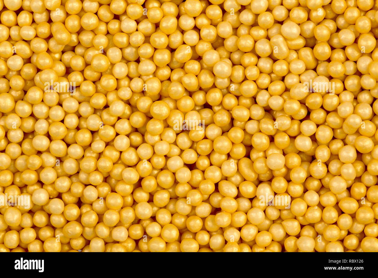 Orange gum ball background. Abstract food texture. Stock Photo