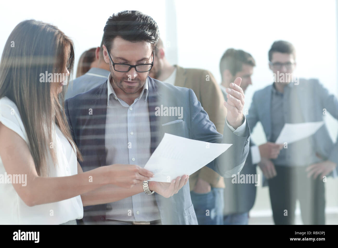 boss and assistant to discuss the work schedule Stock Photo
