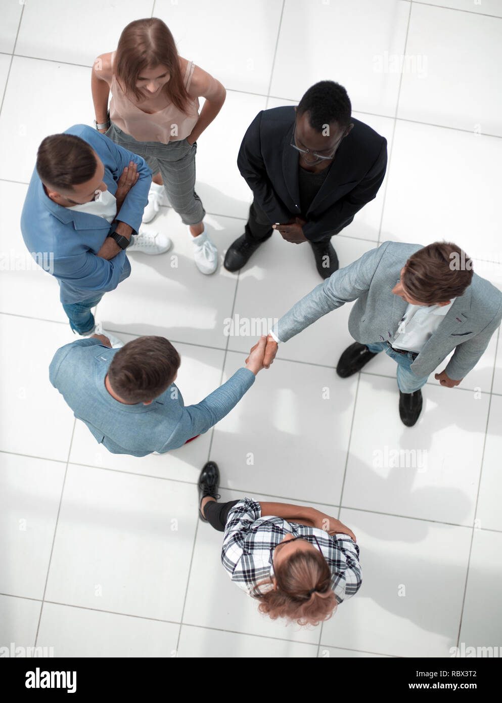 Aerial meeting table handshake hi-res stock photography and images - Alamy