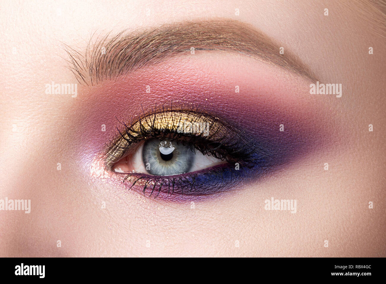 Closeup of beautiful woman eye with fashion makeup Stock Photo