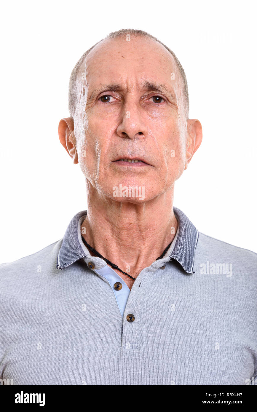 Face of senior man isolated against white background Stock Photo