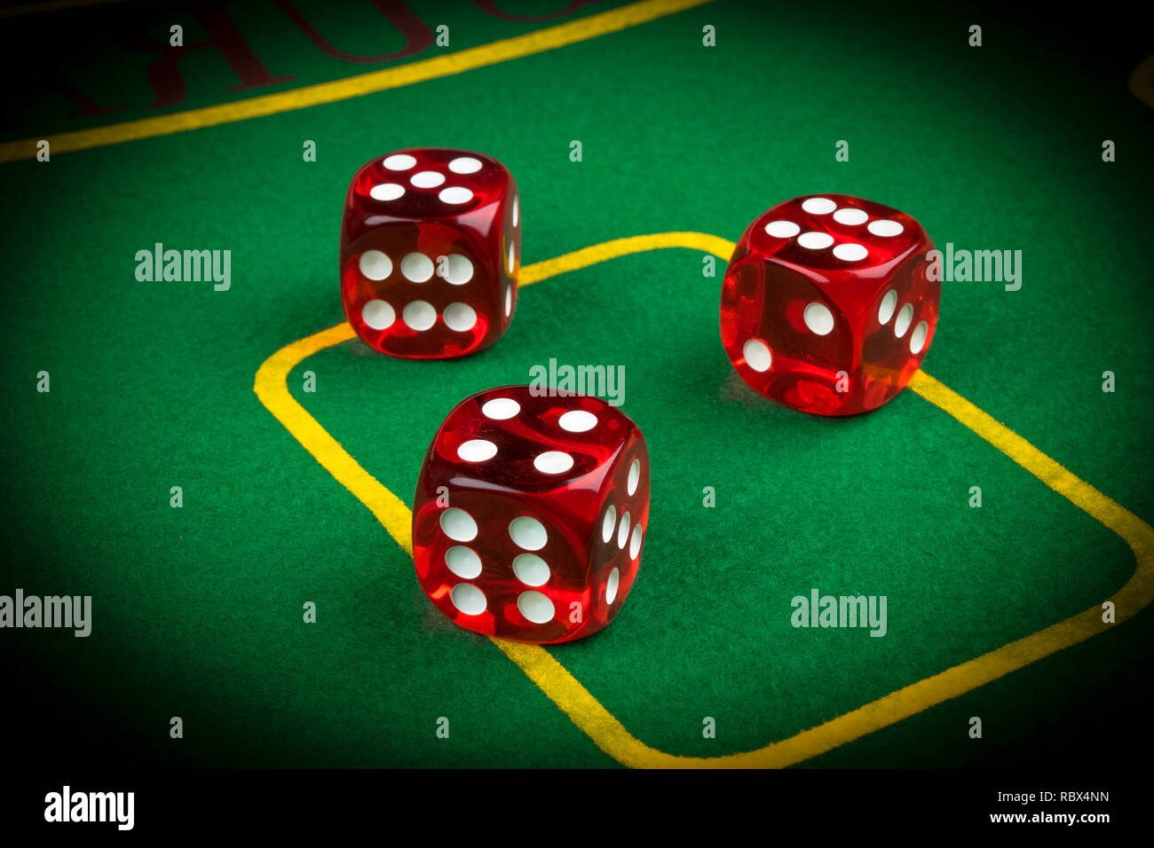 risk concept playing dice on a green gaming table. Playing a game