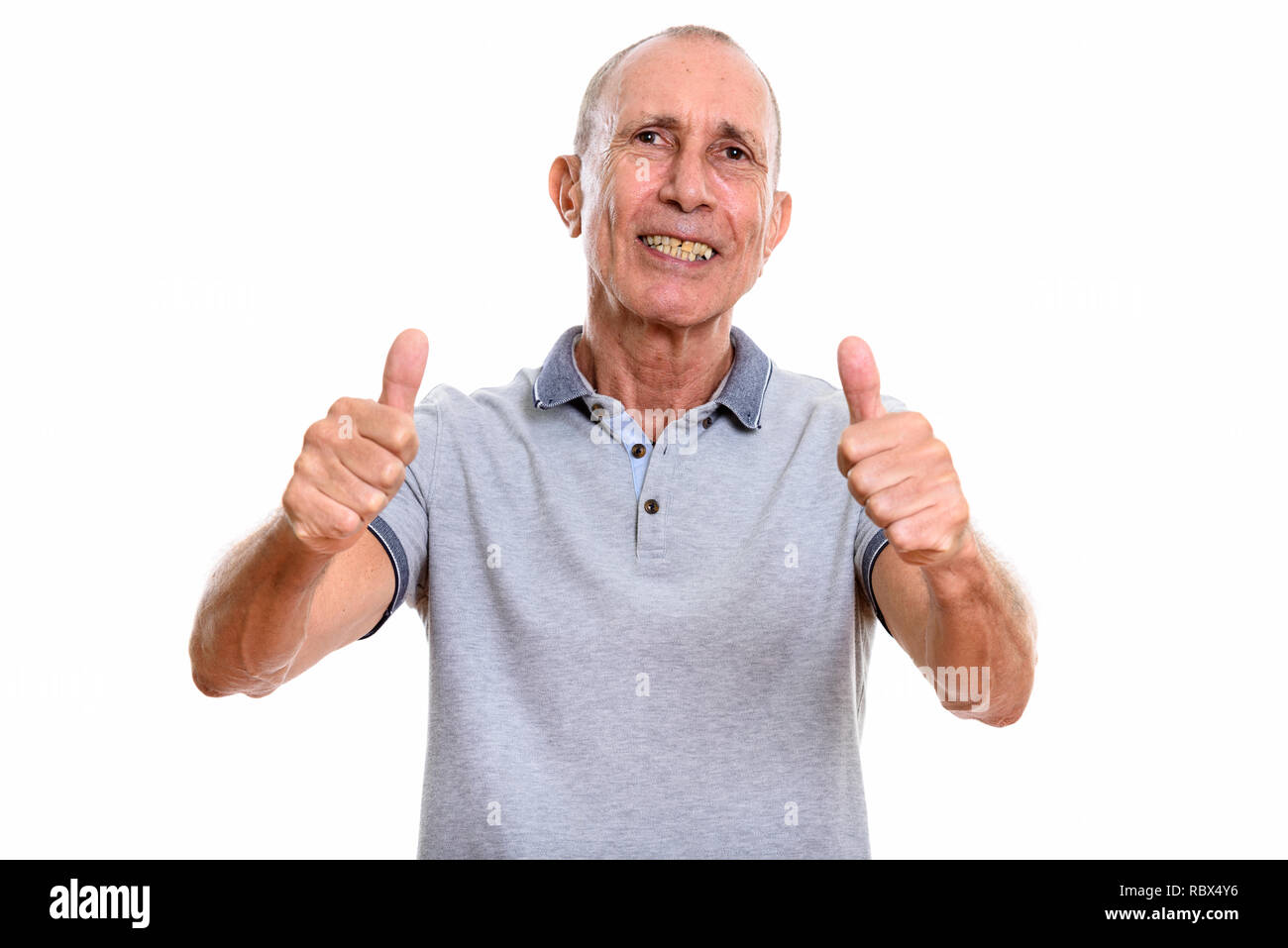 Retired man giving thumbs up hi-res stock photography and images - Alamy