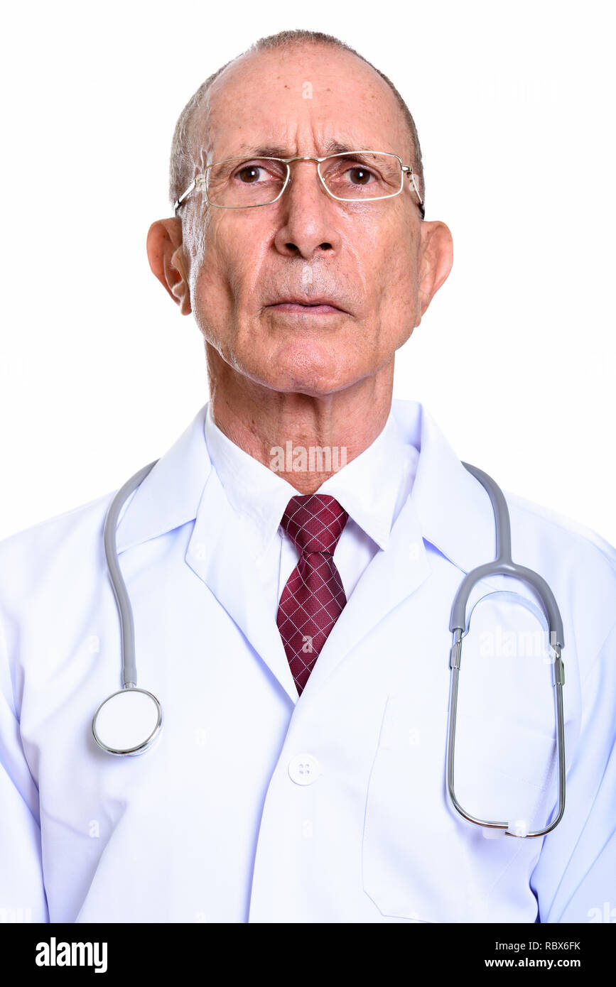 Face of senior man doctor isolated against white background Stock Photo