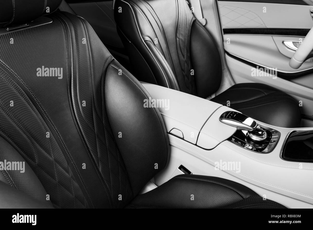 Modern Luxury car inside. Interior of prestige modern car. Comfortable leather seats. Perforated