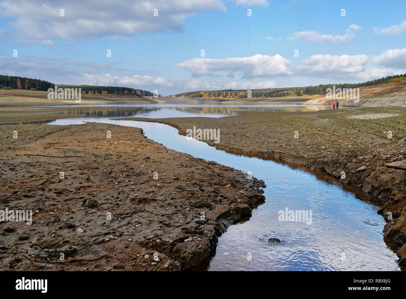 View to the dam wall of a dam with low water level, the dryness is clearly visible, consequence of the hot summer 2018 - Location: Germany, Saxony Stock Photo