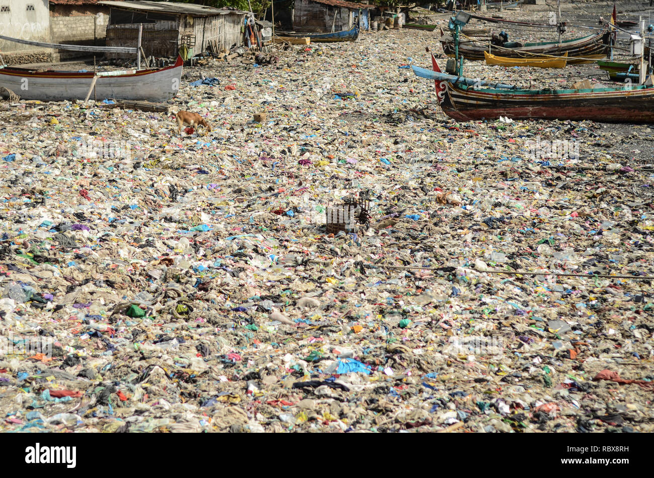 Plastic rubbish pollution on the beach of Java. Stock Photo