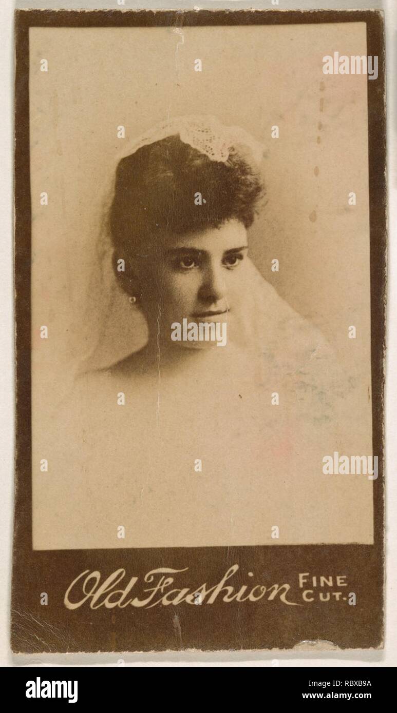 709479 Actress wearing lace headpiece, from the Actresses series (N664) promoting Old Fashion Fine Cut Tobacco Stock Photo