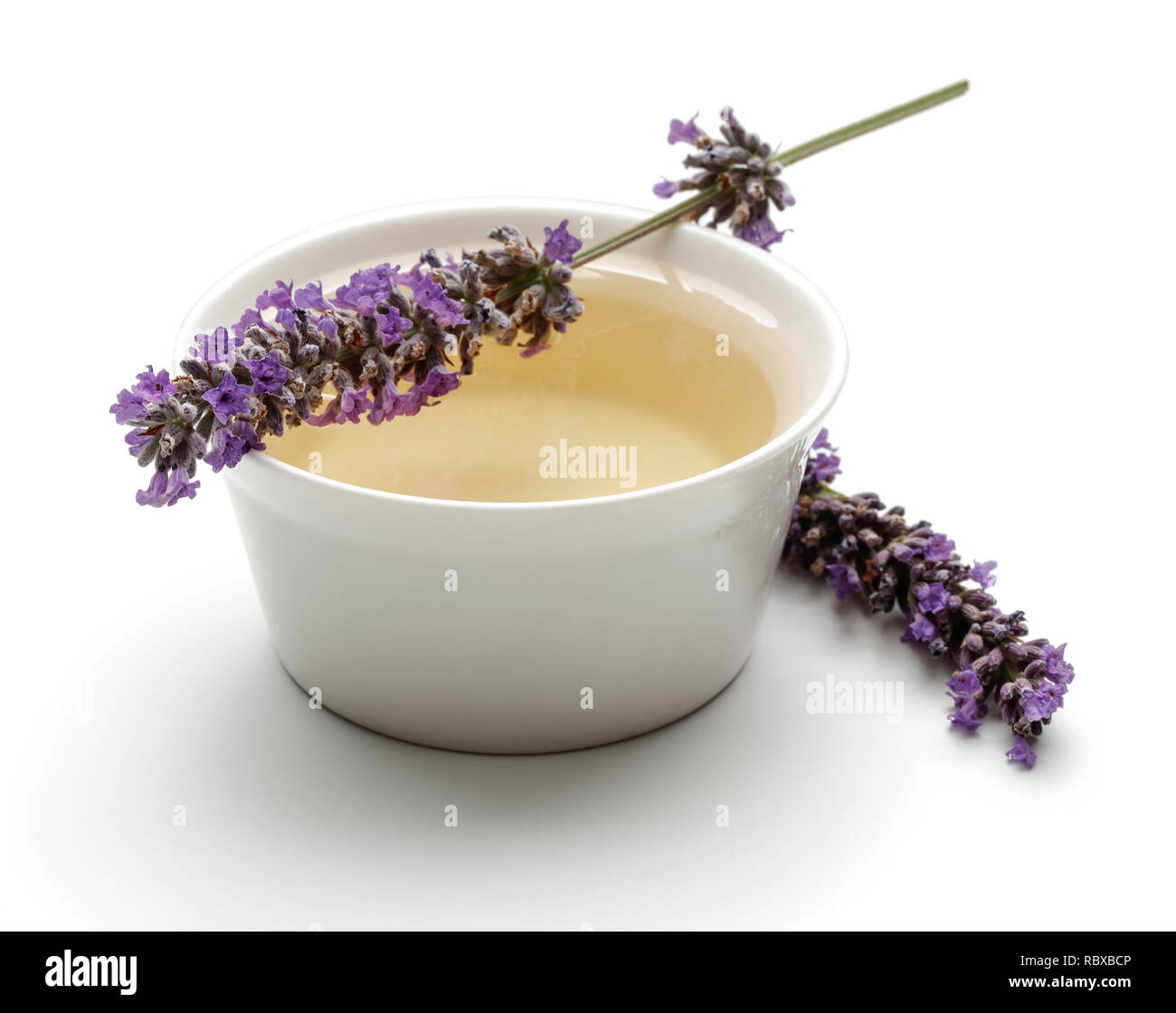 Fresh lavender and oil isolated on white background Stock Photo - Alamy