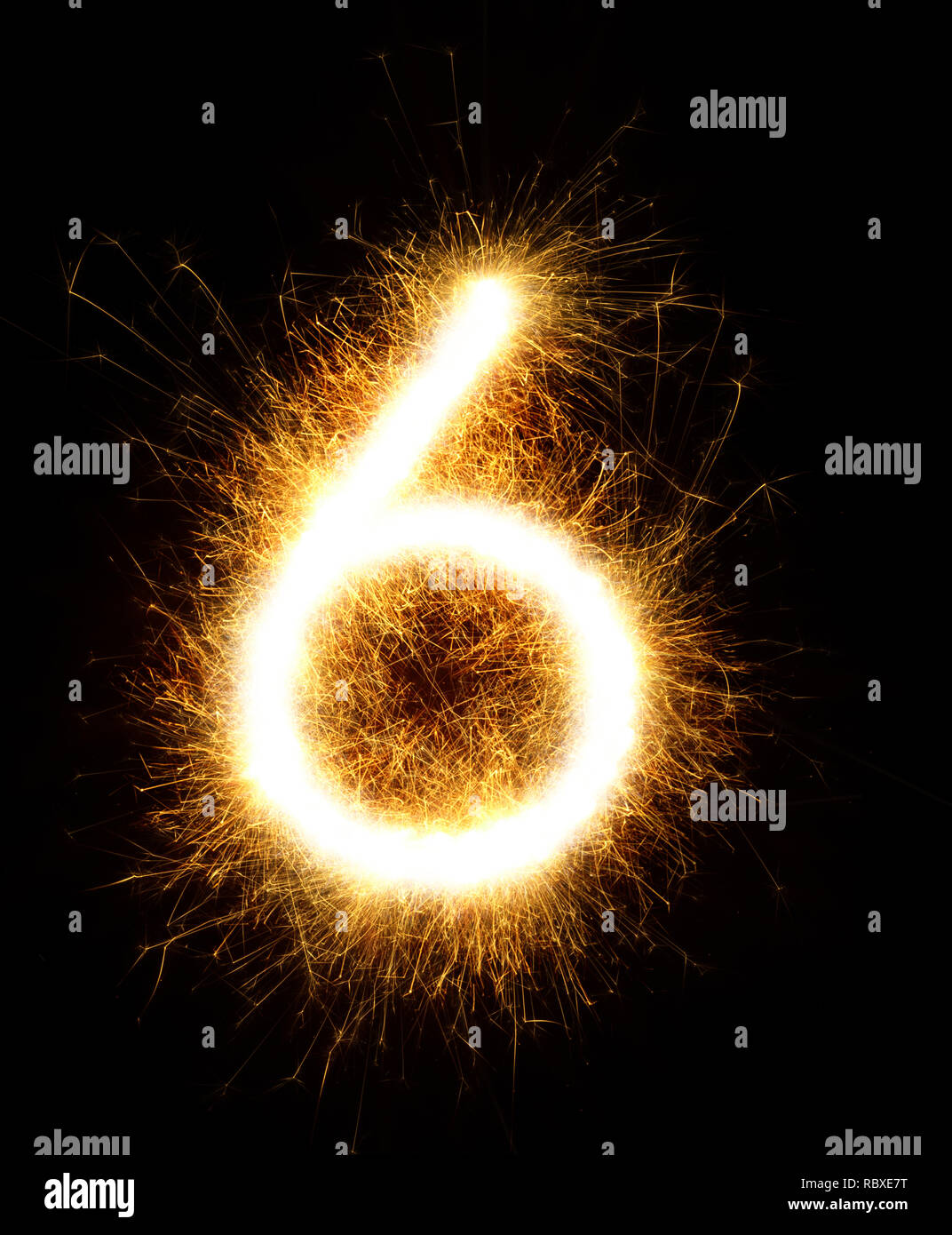 Number 6 drawn with spaklers on a black background Stock Photo - Alamy