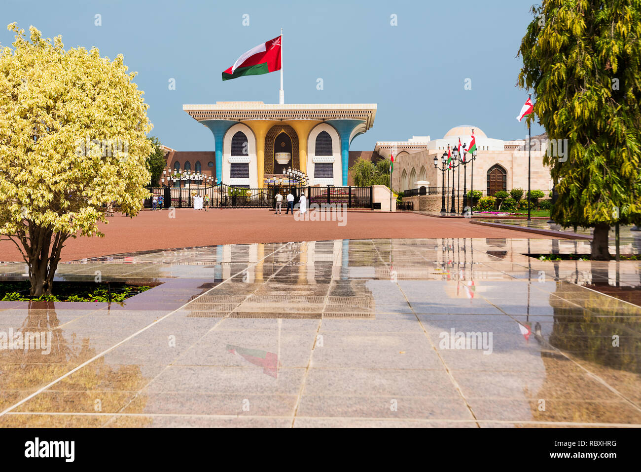 Muscat, Oman - November 1, 2018: Sultan Qaboos Palace in Muscat with tourists and reflections on the marbles Stock Photo