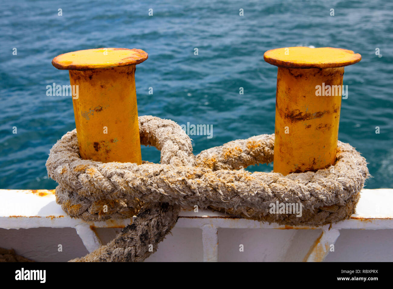 Mooring bollard on a Greek ferry with rope. Stock Photo