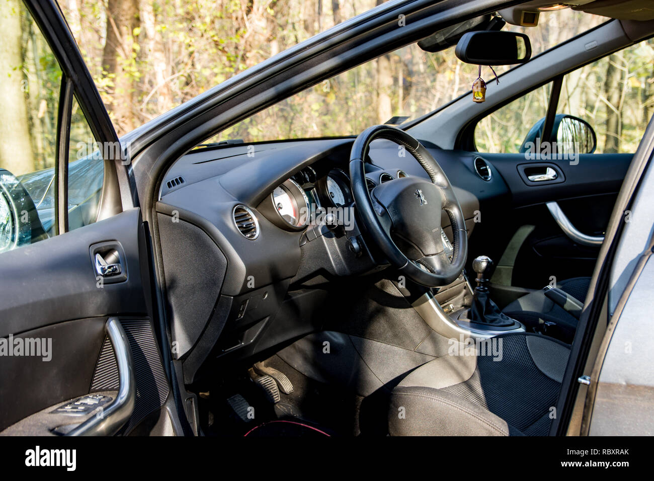 Belgrade, Serbia - 11.21.2018 / Interior images of a Peugeot 308 hdi, parked on mountain road, near the forest. Nice design of a dashboard Stock Photo