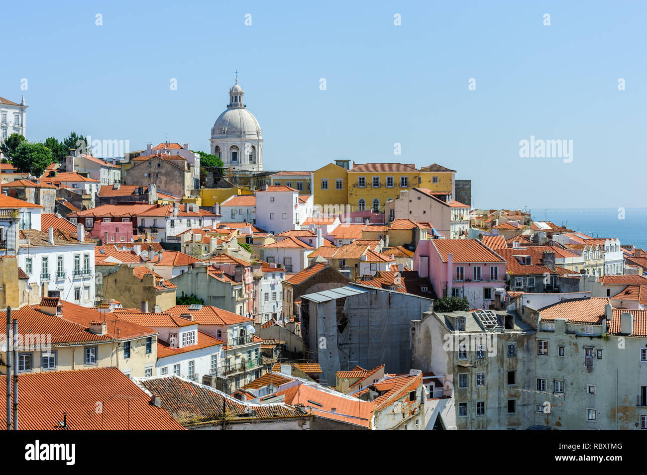 The red roofs of the old houses in the Alfama district in Lisbon, Portugal. Stock Photo